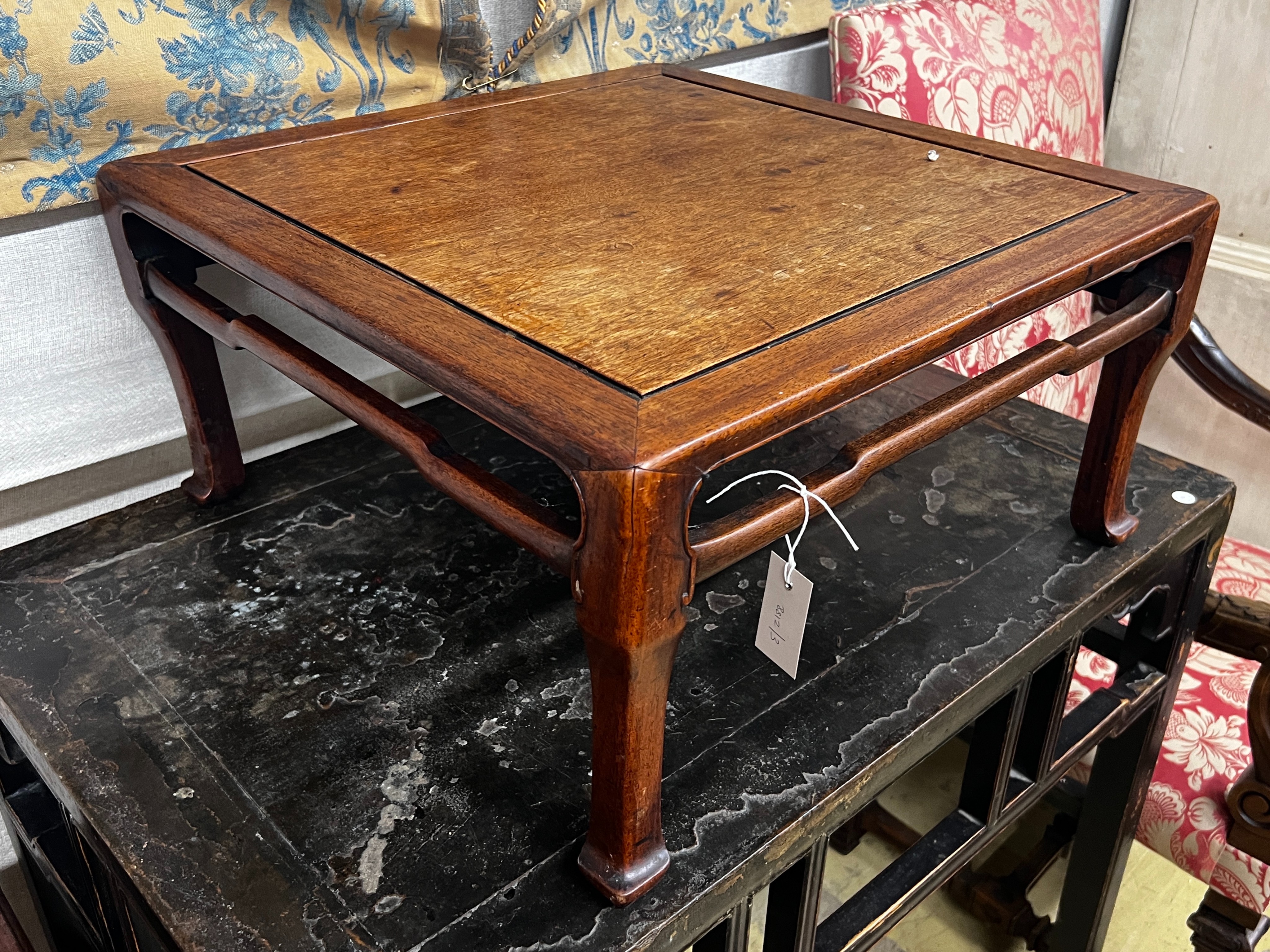 A Chinese carved hardwood square low table, width 59cm, height 29cm